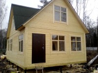 Maison de bricolage à partir de poutres collées: nous construisons avec des professionnels! Instructions pour la construction d'une maison + 100 photos